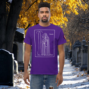 Man wearing a purple Silent Vigil t-shirt with white line art of Death standing in a framed scene, graveyard path dusted with snow in the background.