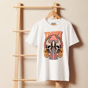 Mid-light organic cotton t-shirt showing a split skull divided by a pink mushroom, with flowing psychedelic shapes and small smiley faces.