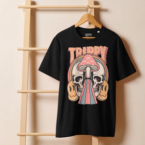 Heavyweight organic cotton t-shirt featuring a split skull pierced by a pink mushroom, with melting psychedelic shapes and small smiley faces.