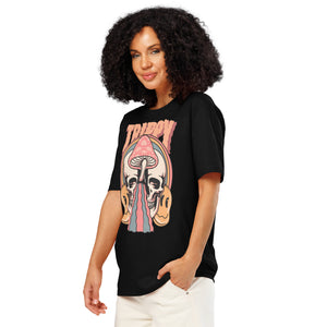 Heavyweight organic cotton t-shirt featuring a split skull pierced by a pink mushroom, with melting psychedelic shapes and small smiley faces.