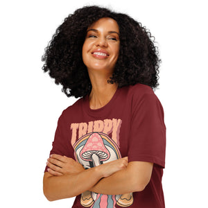 Heavyweight organic cotton t-shirt featuring a split skull pierced by a pink mushroom, with melting psychedelic shapes and small smiley faces.