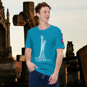 Man wearing an aqua Skeletal Serenity Core Tee with minimalist Grim Reaper design, surrounded by weathered tombs and greenery.