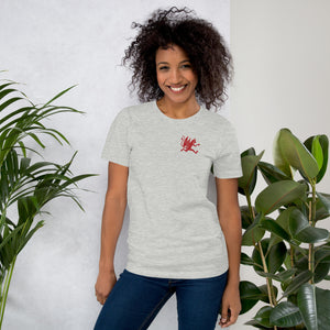 Artificial Perdition devil mascot, red illustrated devil mid-stride with trident and brand name, hand-drawn style on black, official logo tee