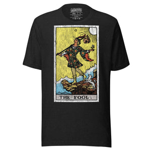The Fool tarot card, figure at cliff's edge with staff and flower, dog at heel, vintage Rider-Waite engraving style, Artificial Perdition