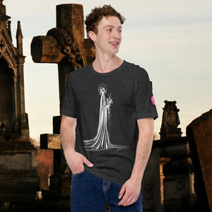 Man wearing a dark grey heather Skeletal Serenity Core Tee with minimalist Grim Reaper design, surrounded by weathered tombs and greenery.