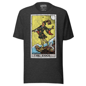 The Fool tarot card, figure at cliff's edge with staff and flower, dog at heel, vintage Rider-Waite engraving style, Artificial Perdition