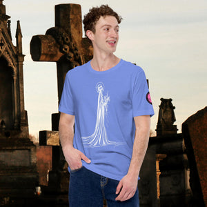 Man wearing a heather columbia blue Skeletal Serenity Core Tee with minimalist Grim Reaper design, surrounded by weathered tombs and greenery.