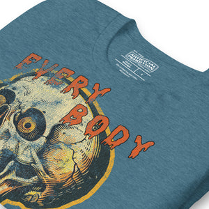 Product mockupDie-cut skull with amber eyes and dripping orange horror font reading EVERY BODY DIES, vintage pulp style, Artificial Perdition apparel