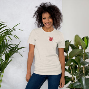 Artificial Perdition devil mascot, red illustrated devil mid-stride with trident and brand name, hand-drawn style on black, official logo tee