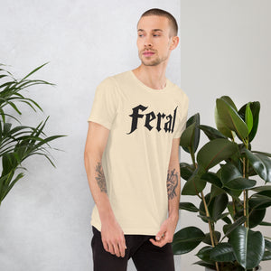 Feral in white blackletter font on dark heather grey t-shirt, bold single word graphic design, Artificial Perdition apparel
