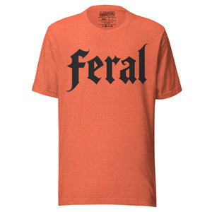 Feral in white blackletter font on dark heather grey t-shirt, bold single word graphic design, Artificial Perdition apparel