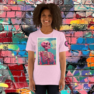 Woman wearing a heather prism lilac Deconstruct Core Tee with colorful skeletal design gazing upward, standing before a vibrant graffiti wall.
