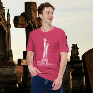 Man wearing a heather raspberry Skeletal Serenity Core Tee with minimalist Grim Reaper design, surrounded by weathered tombs and greenery.