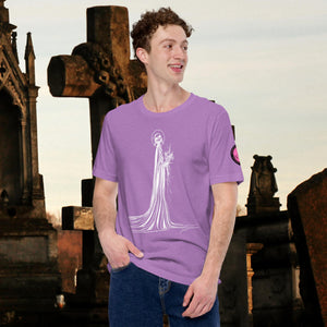 Man wearing a heather team purple Skeletal Serenity Core Tee with minimalist Grim Reaper design, surrounded by weathered tombs and greenery.