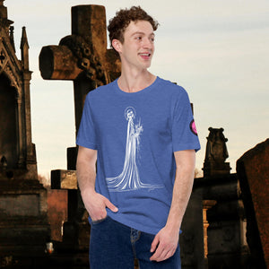 Man wearing a royal blue Skeletal Serenity Core Tee with minimalist Grim Reaper design, surrounded by weathered tombs and greenery.