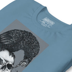 Graphite illustration of a black corvid perched on a human skull removing the eye, sprouting branch beside it, Last Look, Artificial Perdition apparel