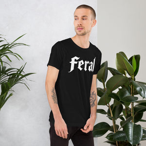 Product mockupFeral in white blackletter font on dark heather grey t-shirt, bold single word graphic design, Artificial Perdition apparel