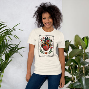 Tarot card illustration numbered X with an anatomical heart in bloom surrounded by wildflowers and vines, Amor Fati, Artificial Perdition apparel