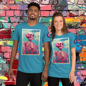 Woman wearing an aqua Triblend Deconstruct Core Tee with colorful skeletal design gazing upward, standing before a vibrant graffiti wall.