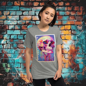 Woman wearing an athletic grey triblend Discordance Premium Tee with surreal neon skull artwork against a colorful graffiti backdrop.