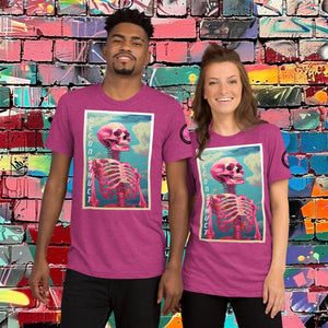 Woman wearing a berry Triblend Deconstruct Core Tee with colorful skeletal design gazing upward, standing before a vibrant graffiti wall.