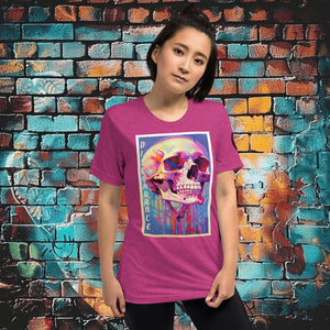 Woman wearing a berry triblend Discordance Premium Tee with surreal neon skull artwork against a colorful graffiti backdrop.