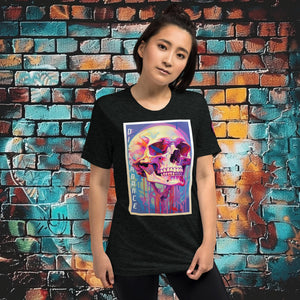 Woman wearing a charcoal black triblend Discordance Premium Tee with surreal neon skull artwork against a colorful graffiti backdrop.