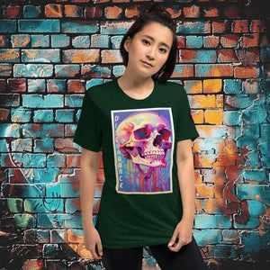 Woman wearing an emerald triblend Discordance Premium Tee with surreal neon skull artwork against a colorful graffiti backdrop.