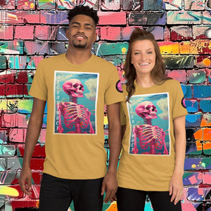 Woman wearing a mustard Triblend Deconstruct Core Tee with colorful skeletal design gazing upward, standing before a vibrant graffiti wall.