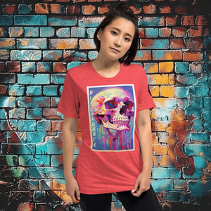 Woman wearing a red triblend Discordance Premium Tee with surreal neon skull artwork against a colorful graffiti backdrop.