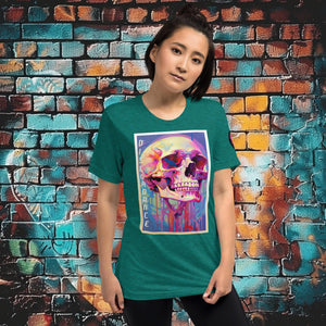 Woman wearing a teal triblend Discordance Premium Tee with surreal neon skull artwork against a colorful graffiti backdrop.