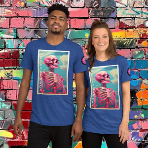 Woman wearing a true royal Triblend Deconstruct Core Tee with colorful skeletal design gazing upward, standing before a vibrant graffiti wall.