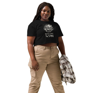 Black cropped cotton t-shirt featuring horned monster inside a ritual circle with mystical script and “Monster Inside” text.