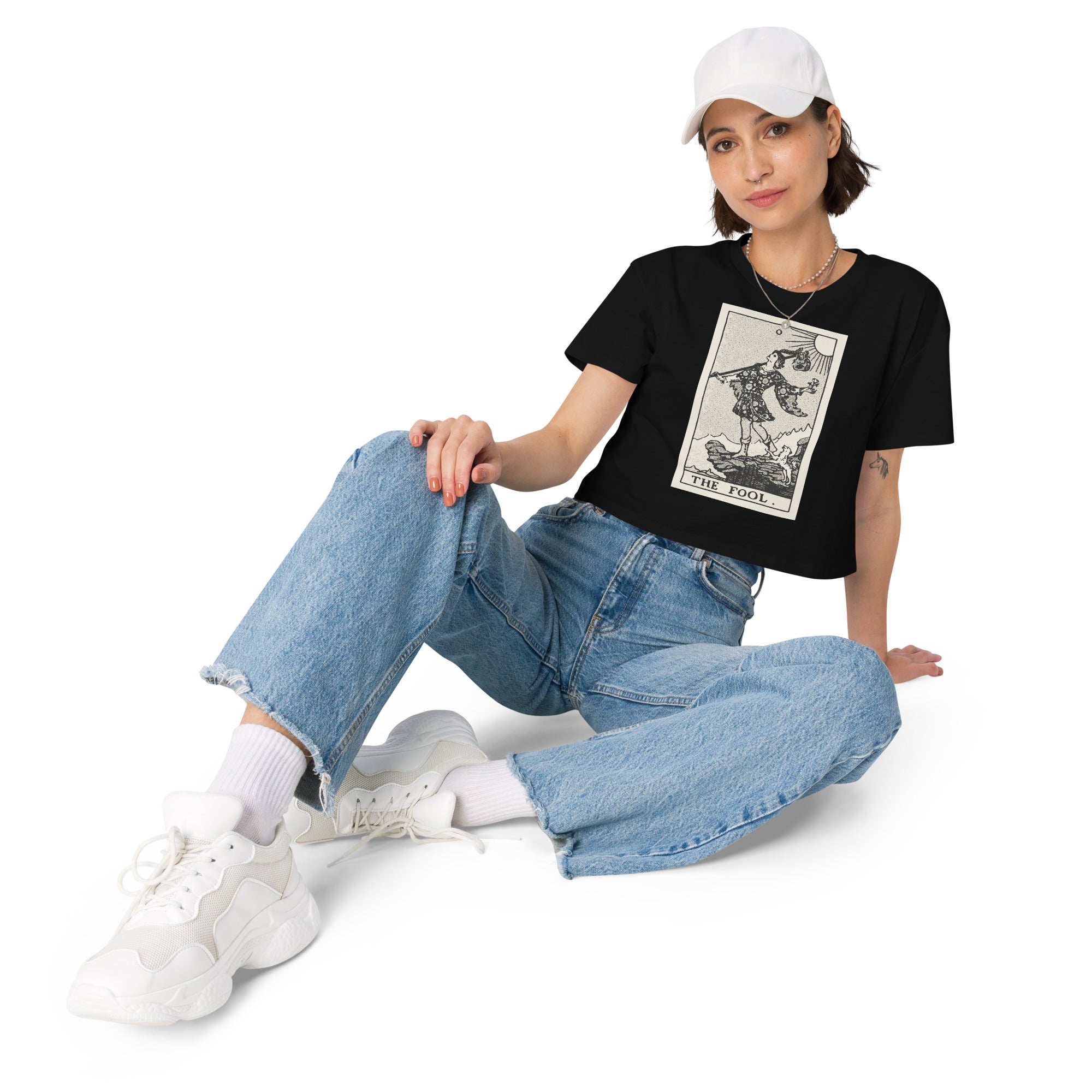 Cropped cotton t-shirt featuring The Fool tarot card rendered in modern woodcut style.