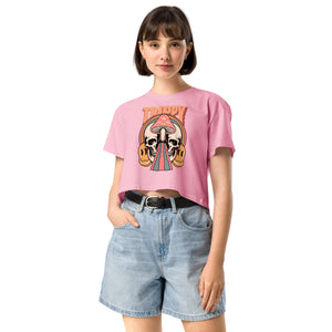 Cropped tee featuring a split skull and mushroom design with melting psychedelic color and smiley faces. Soft combed cotton, eco-friendly inks, playful surreal vibe.