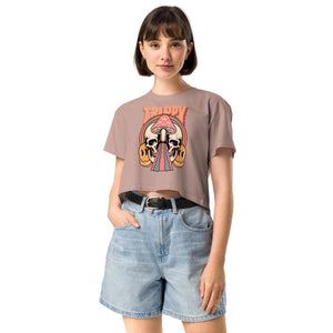 Cropped tee featuring a split skull and mushroom design with melting psychedelic color and smiley faces. Soft combed cotton, eco-friendly inks, playful surreal vibe.