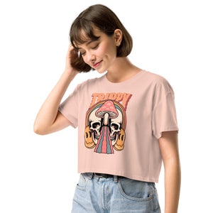 Cropped tee featuring a split skull and mushroom design with melting psychedelic color and smiley faces. Soft combed cotton, eco-friendly inks, playful surreal vibe.