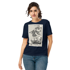 Fitted organic cotton t-shirt featuring The Fool tarot card illustration in high-contrast woodcut rendering.