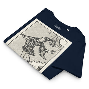 Fitted organic cotton t-shirt featuring The Fool tarot card illustration in high-contrast woodcut rendering.