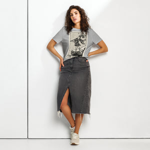 Fitted organic cotton t-shirt featuring The Fool tarot card illustration in high-contrast woodcut rendering.
