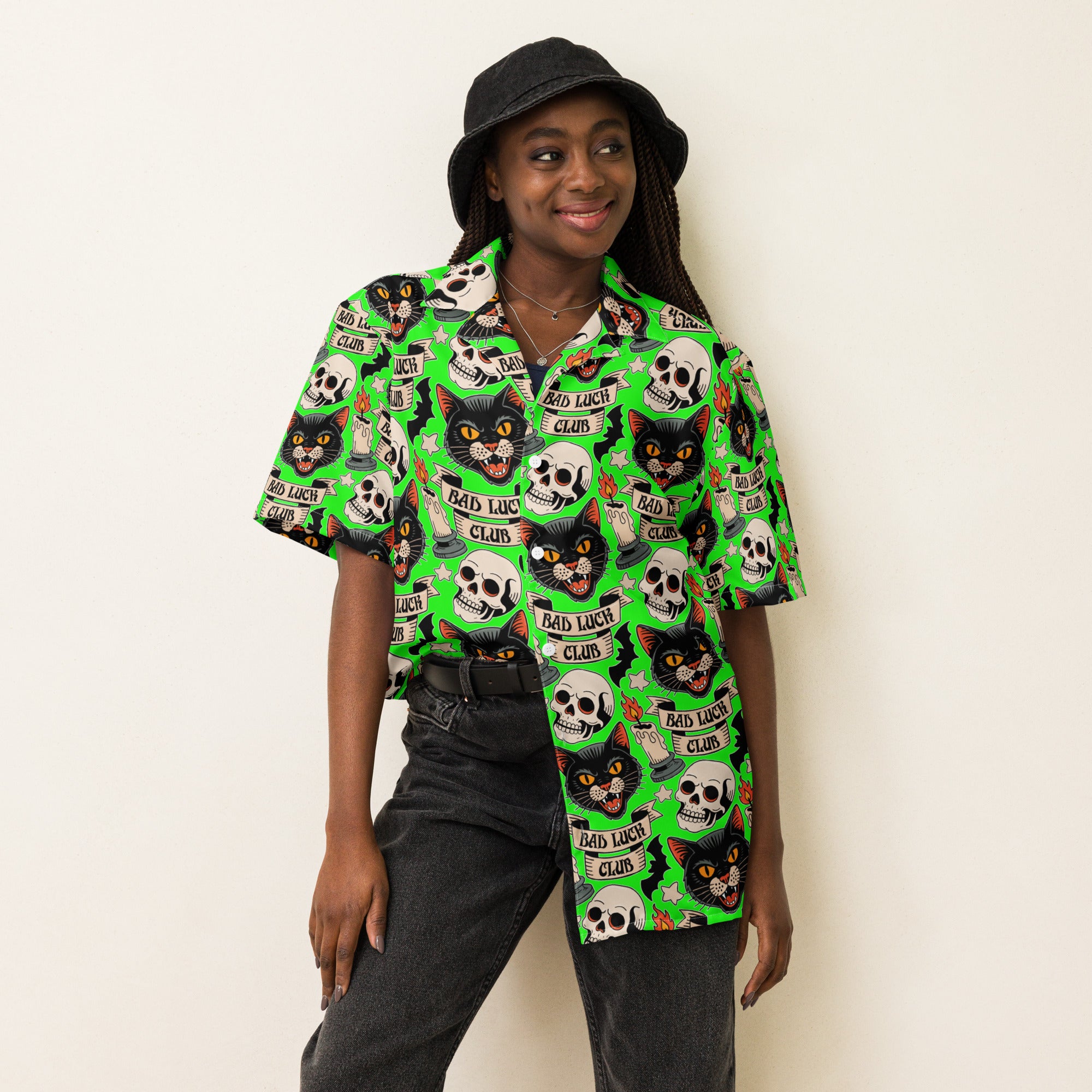 Bad Luck Club all-over print shirt, repeating tattoo flash pattern with black cats, skulls, candles and bats on screaming green, Artificial Perdition