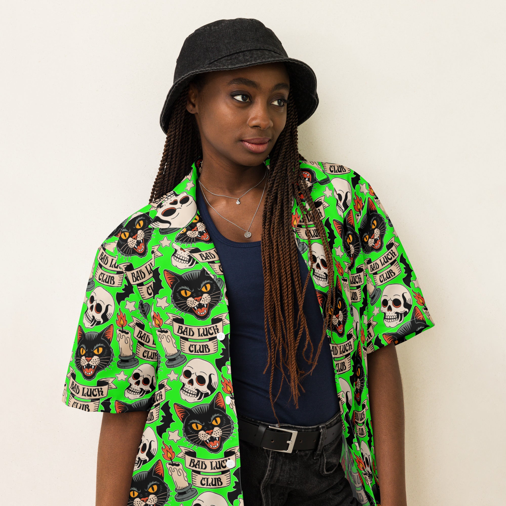 Bad Luck Club all-over print shirt, repeating tattoo flash pattern with black cats, skulls, candles and bats on screaming green, Artificial Perdition