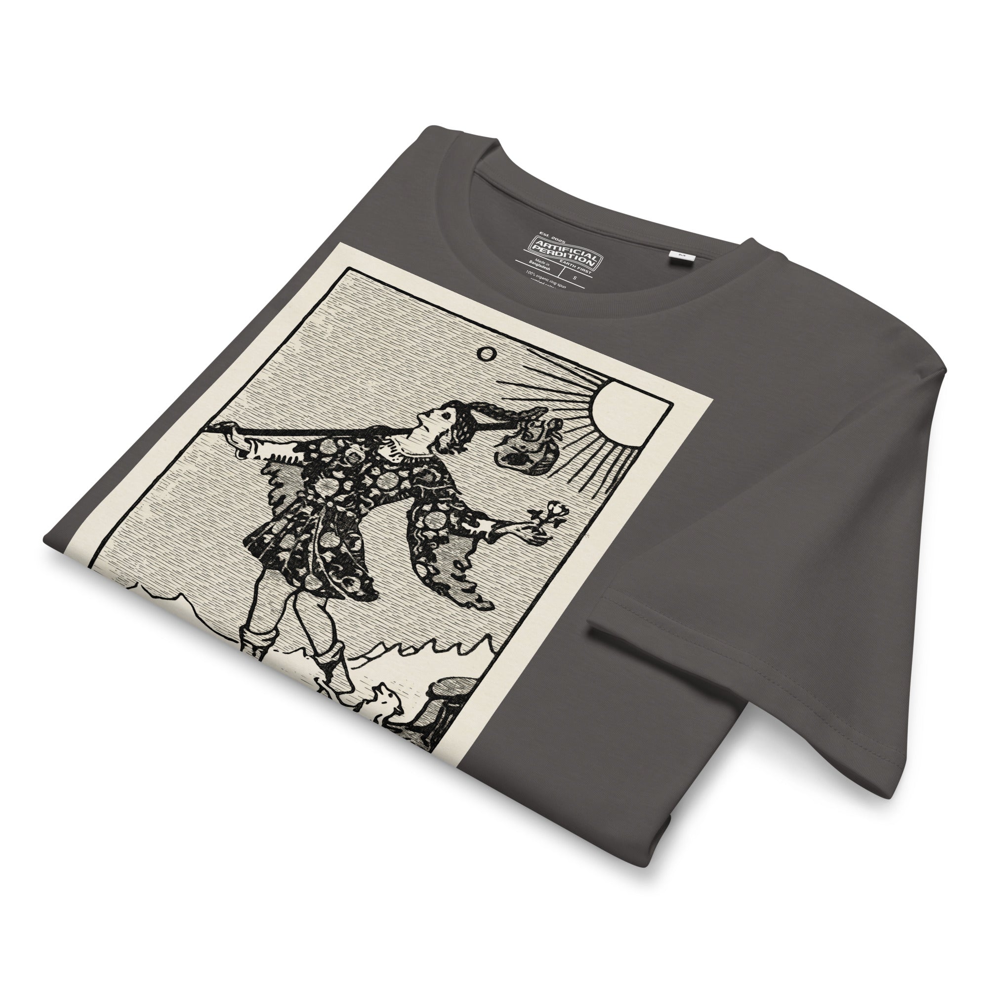 Mid-light organic cotton t-shirt featuring The Fool tarot card with cliff, dog, and sun in high-contrast woodcut rendering.