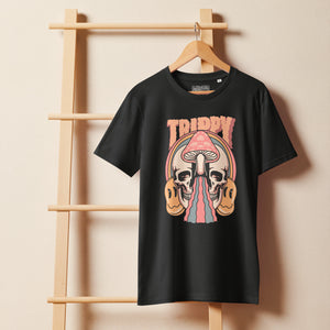 Mid-light organic cotton t-shirt showing a split skull divided by a pink mushroom, with flowing psychedelic shapes and small smiley faces.