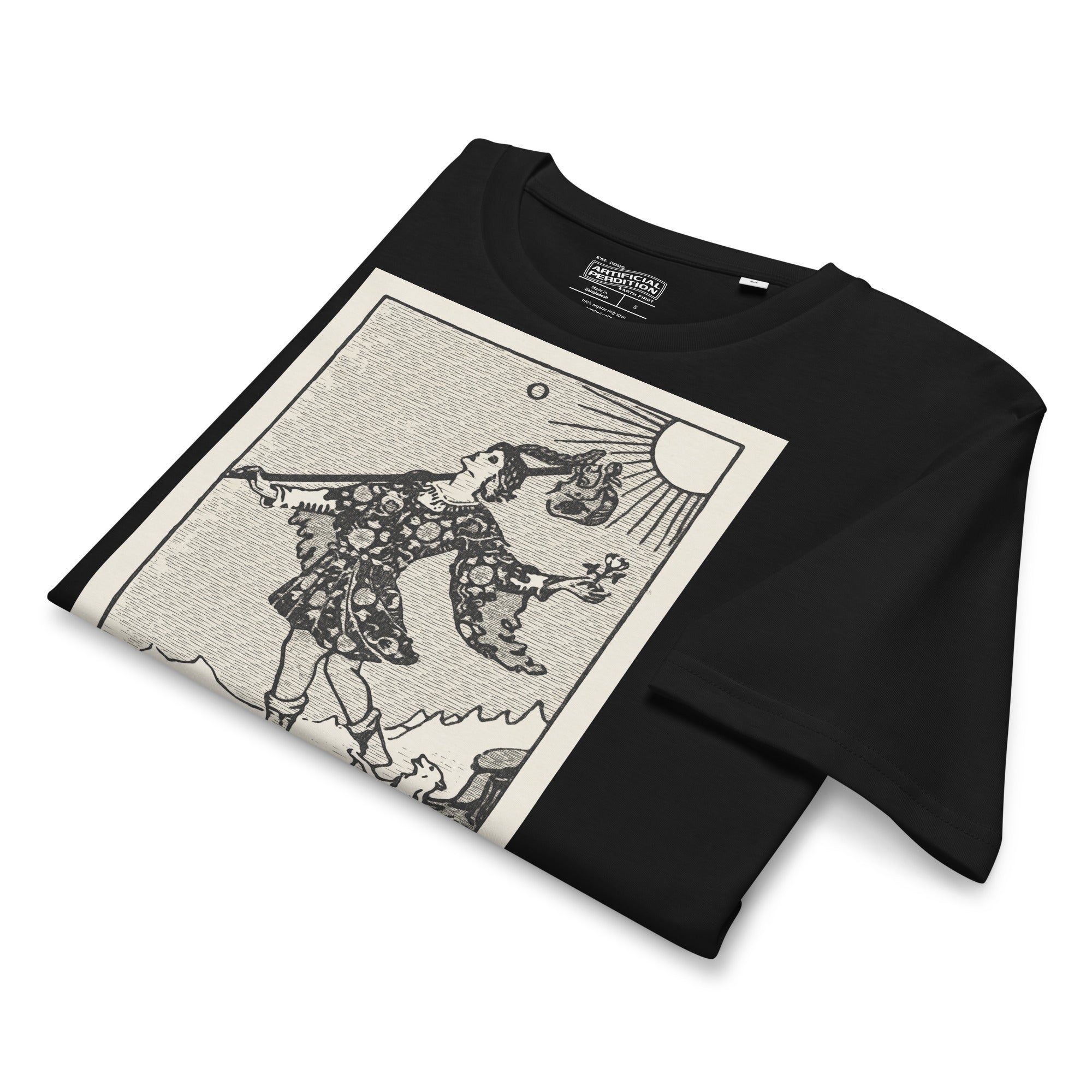 Mid-light organic cotton t-shirt featuring The Fool tarot card with cliff, dog, and sun in high-contrast woodcut rendering.