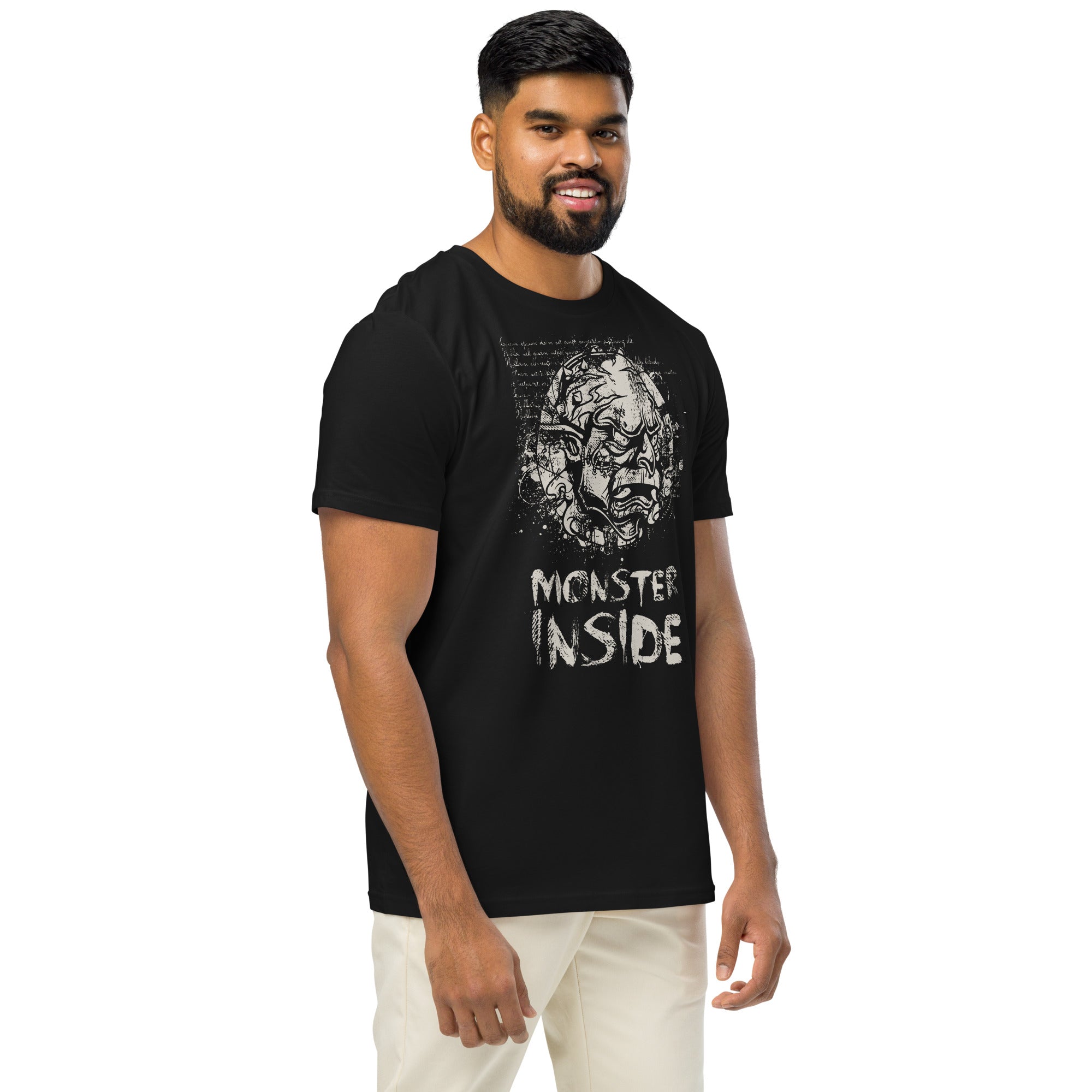 Black organic cotton t-shirt featuring a horned monster breaking from a ritual circle with mystical script and “Monster Inside” text.