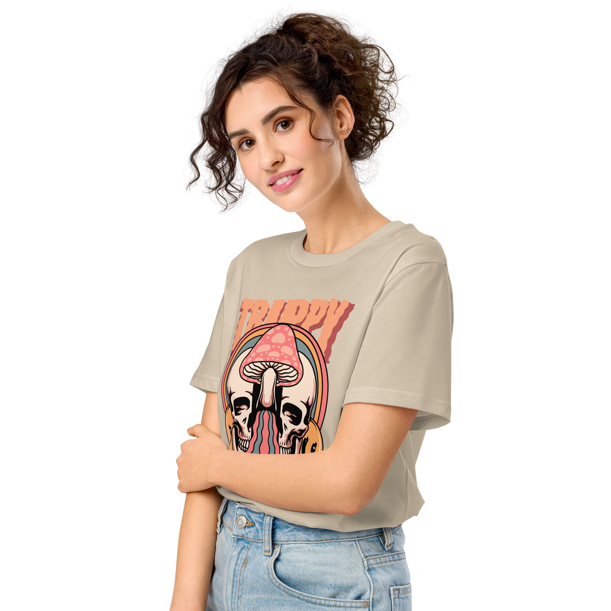 Mid-light organic cotton t-shirt showing a split skull divided by a pink mushroom, with flowing psychedelic shapes and small smiley faces.