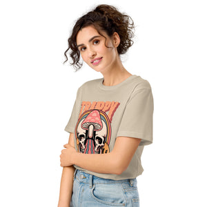Mid-light organic cotton t-shirt showing a split skull divided by a pink mushroom, with flowing psychedelic shapes and small smiley faces.