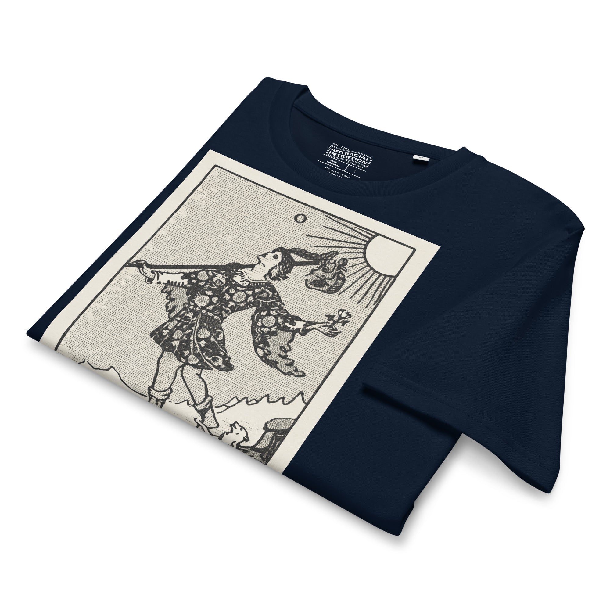 Mid-light organic cotton t-shirt featuring The Fool tarot card with cliff, dog, and sun in high-contrast woodcut rendering.