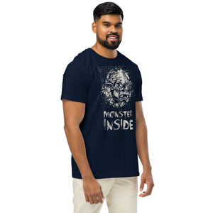Black organic cotton t-shirt featuring a horned monster breaking from a ritual circle with mystical script and “Monster Inside” text.